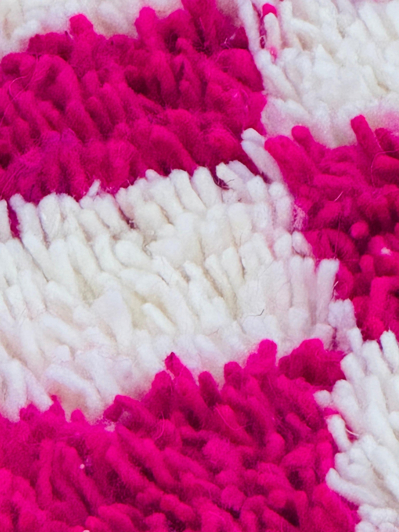 Close-up of Tamilla Moroccan Rug showing pink and white wool texture