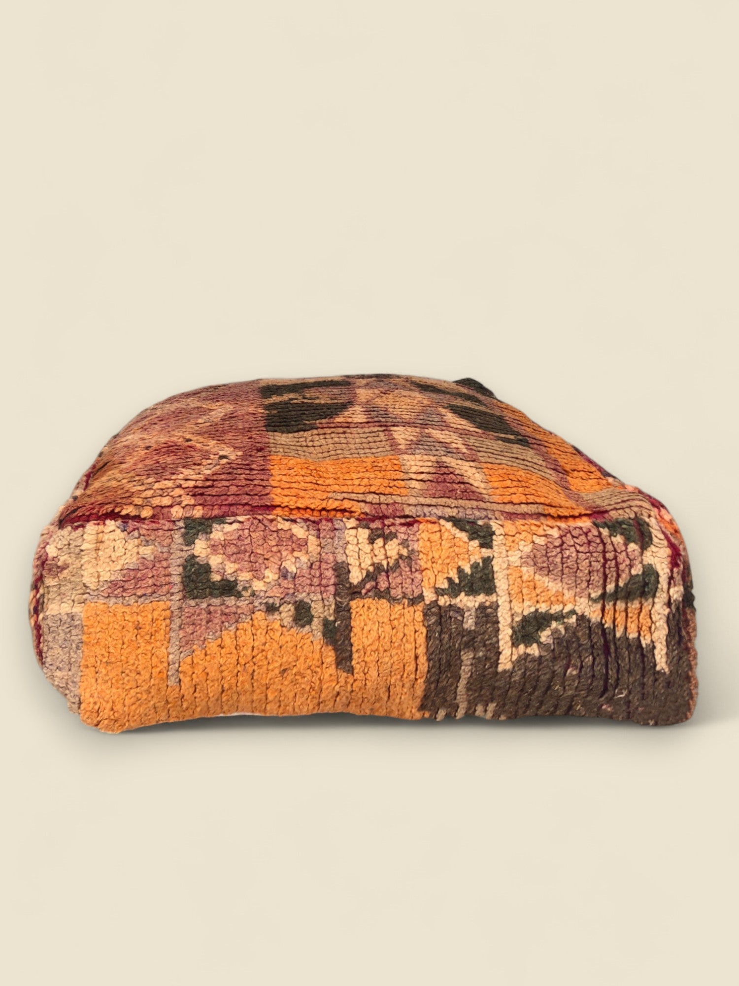 Handmade vintage Moroccan pouffe in tribal colors