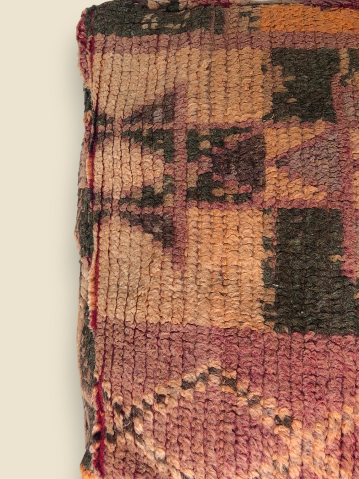Multicolor kilim pouffe in warm Moroccan tones