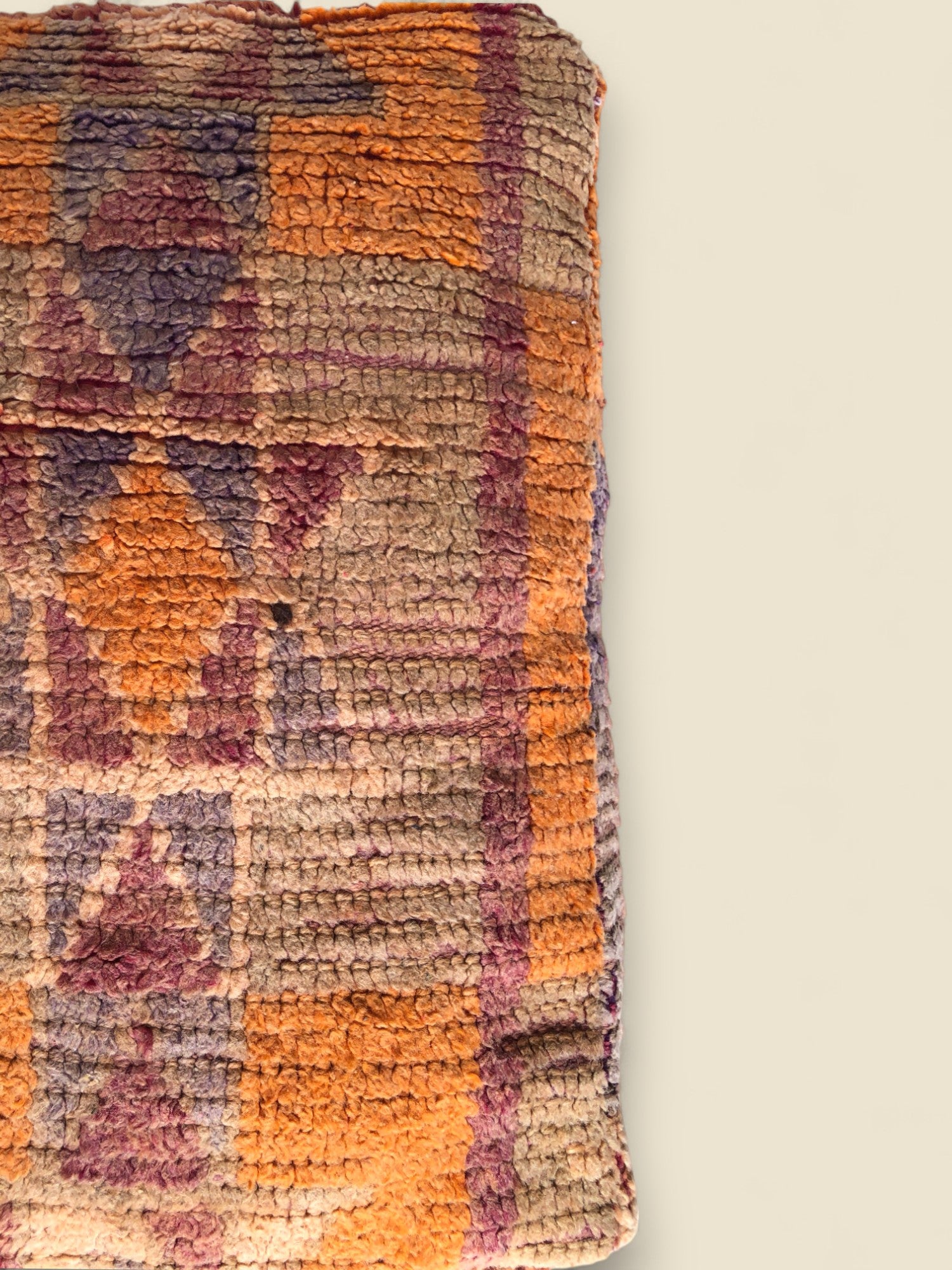 Vintage Moroccan Tazallit pouffe with geometric tribal designs