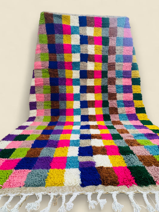 Vibrant handmade Berber Tilawin rug with fringe details