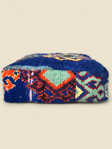 Colorful patterned box on a beige background