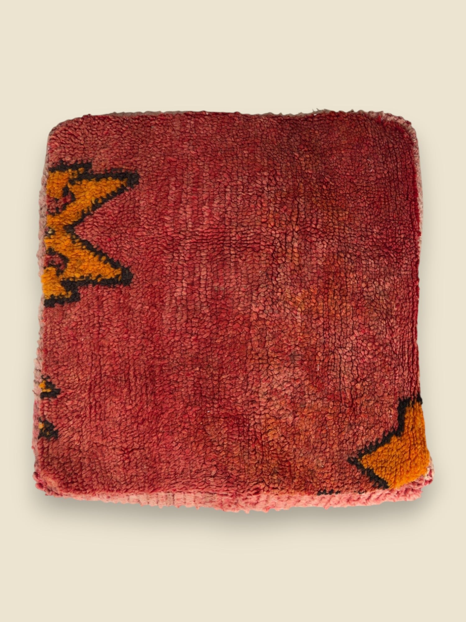 Moroccan floor cushion with warm tones