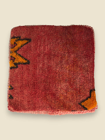 Moroccan floor cushion with warm tones