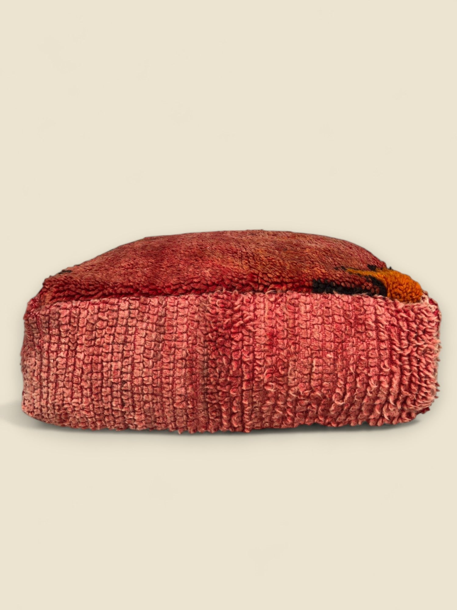 Moroccan floor cushion with warm tones