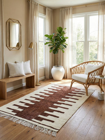 Berber Nara rug in bright sitting room with rattan chair