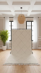 Handmade Azir Berber rug displayed on a stand showing its pattern.