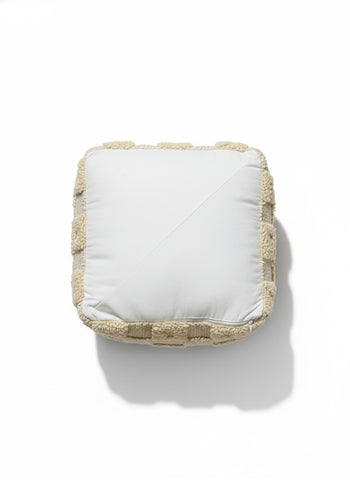 Top view of Berber Azar pouf showing soft handwoven wool texture