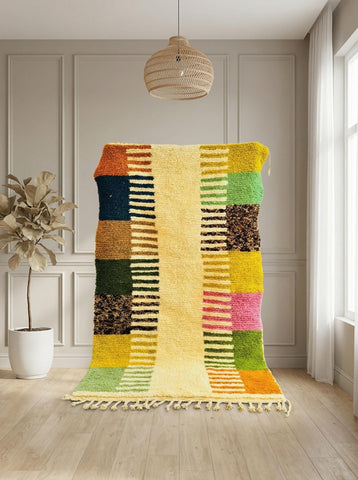 Soft wool Moroccan rug with colorful pattern and tassel edges