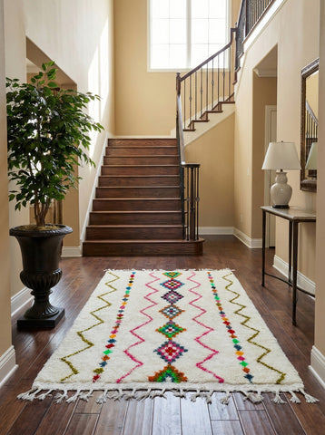 Colorful Berber Ismene rug displayed in a warm entryway
