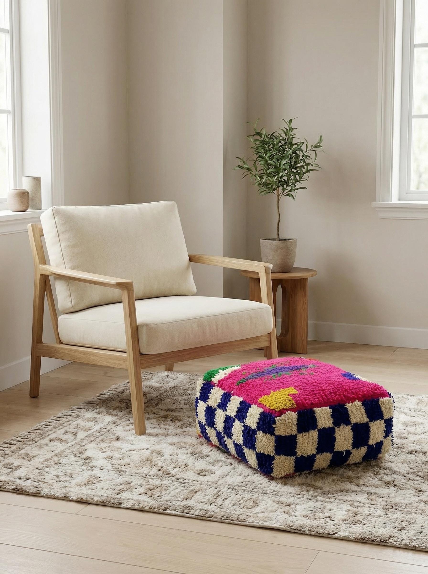 Square Moroccan pouf with vibrant geometric design