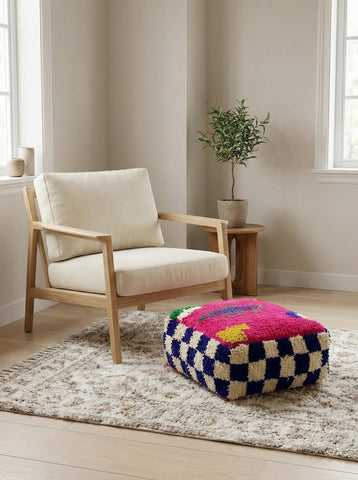 Square Moroccan pouf with vibrant geometric design
