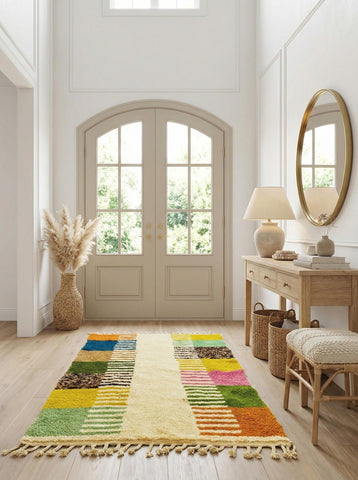 Handwoven Moroccan area rug displayed in bright entryway
