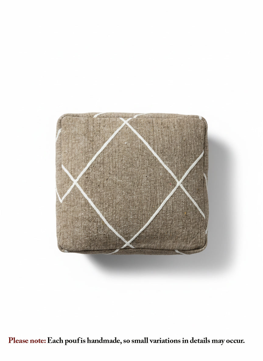 Top view of brown Berber pouf featuring white geometric pattern.