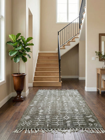 Handmade gray Moroccan Berber Idya rug styled in home entryway