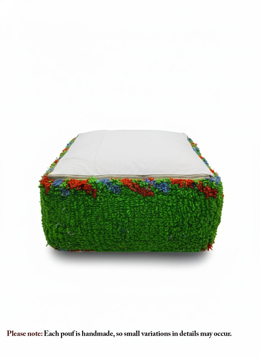 Bottom view of green Berber pouffe with white cotton backing and zipper.