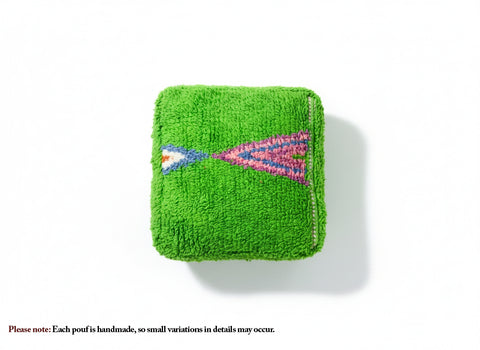 Top view of green Moroccan pouffe with colorful geometric pattern.