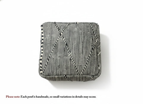 Top view of the black and cream Tamazirt pouf.