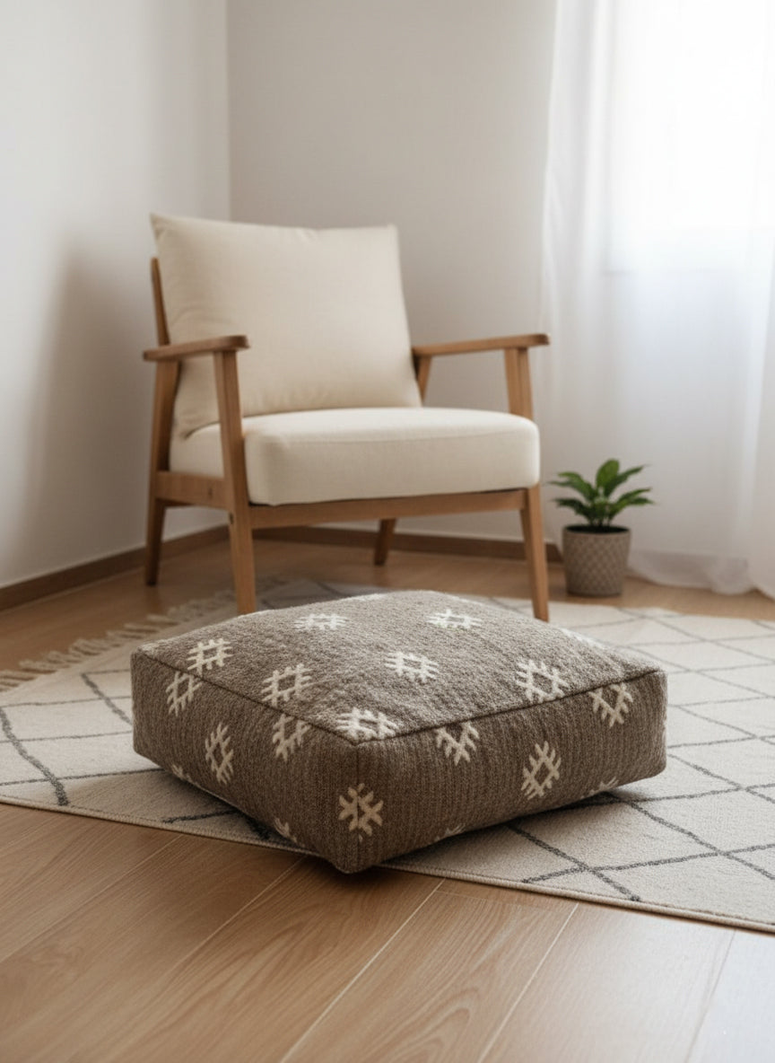 gray wool Berber pouf with white motifs