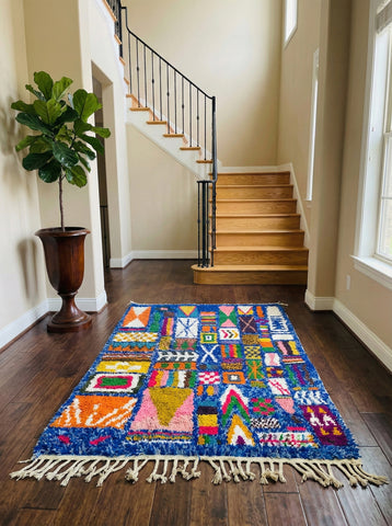 Bright Berber Igran rug in entryway space.