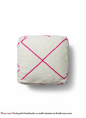Top view of Moroccan pouf with pink cross design