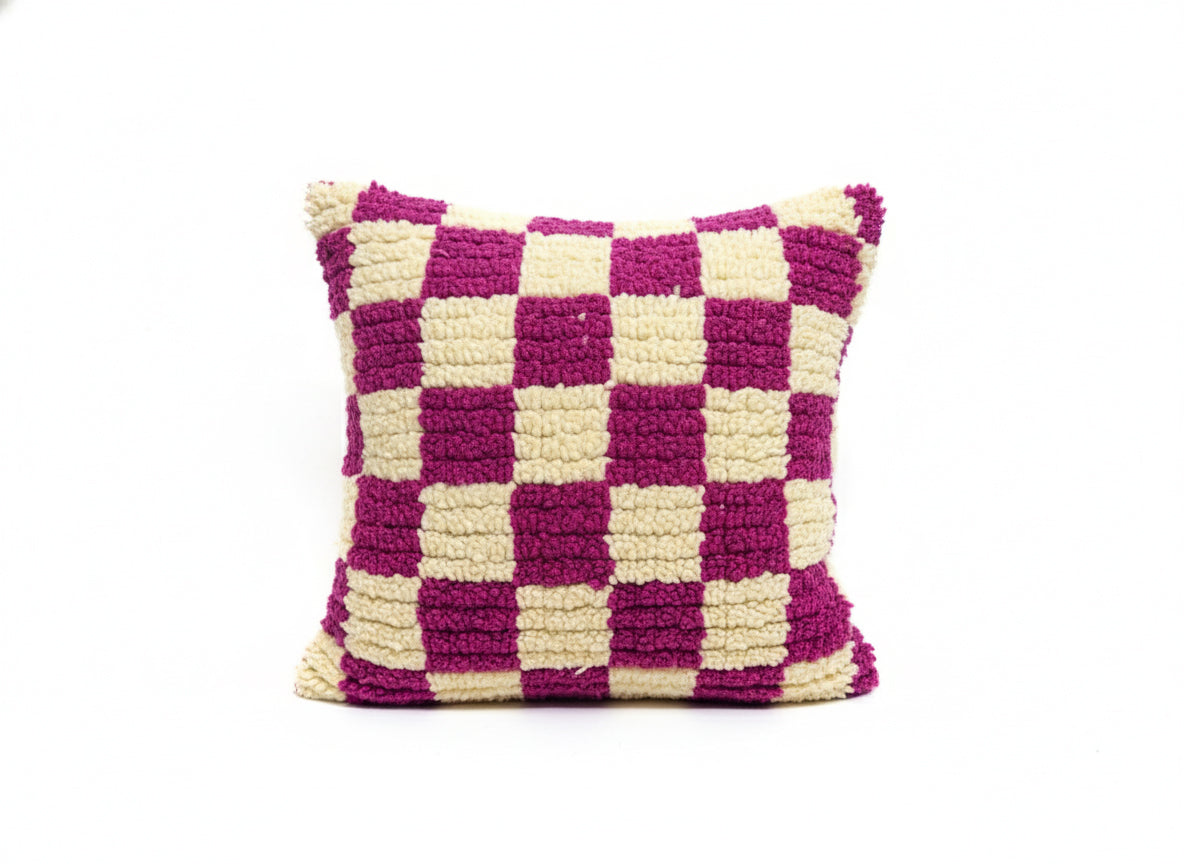 Close-up of Tihlit Moroccan wool cushion with checker pattern