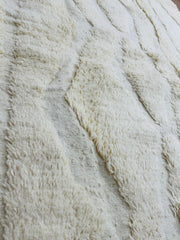 close up photo of the wool beige rug 