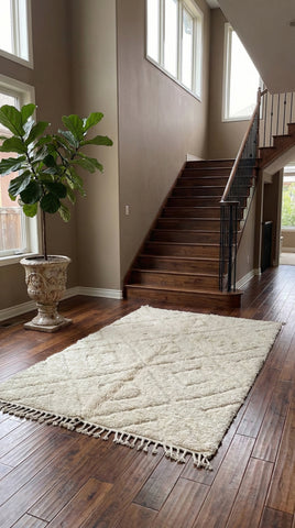 Berber Tazlout rug in ivory wool with subtle diamond pattern in modern hallway