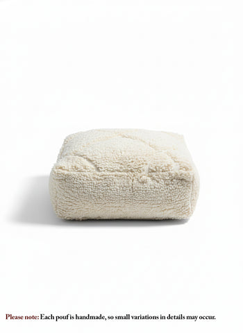 Beige Berber wool pouf with textured stitches, handmade Moroccan floor cushion