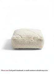 Beige Berber wool pouf with textured stitches, handmade Moroccan floor cushion
